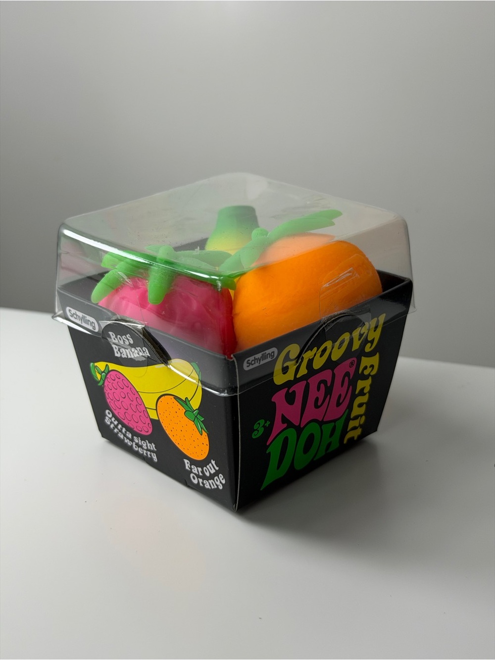 Groovy NeeDoh Fruit Stress Toys - Orange & Pink